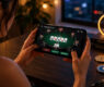 Crypto poker player using a mobile app with Bitcoin and USDT poker clubs